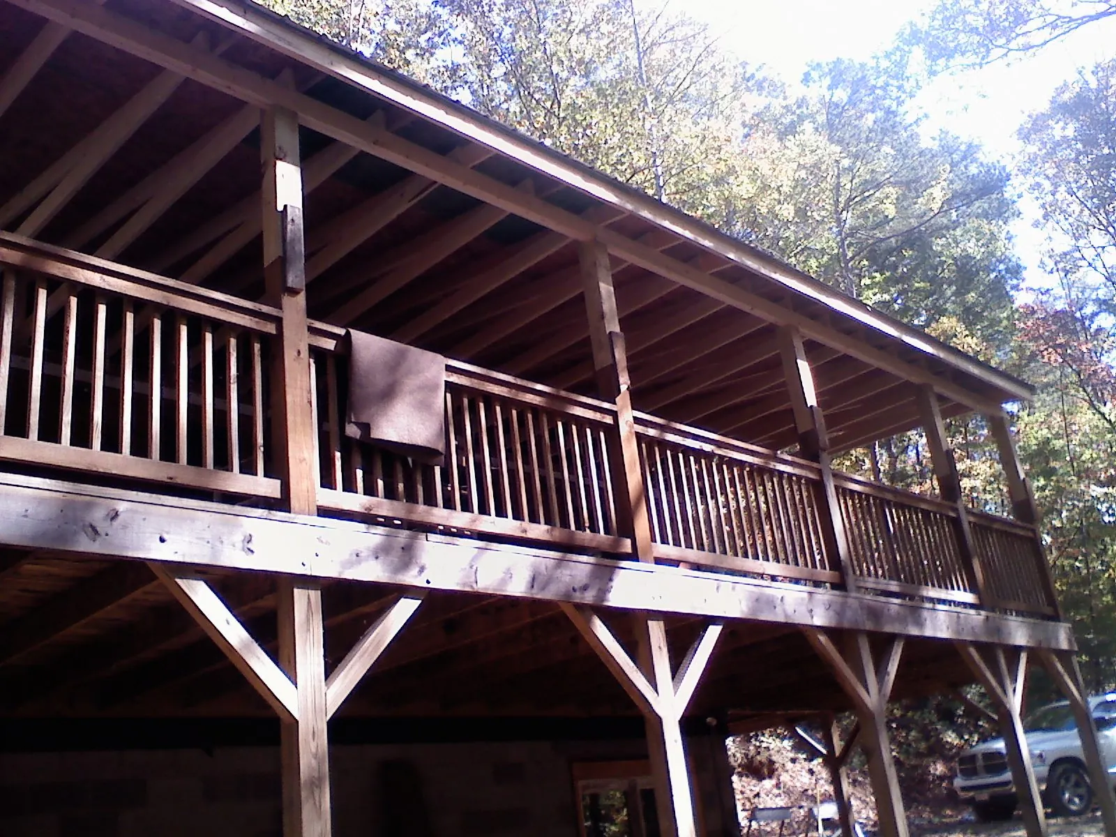Timber framing under a new elevated porch and deck — Roof Leak Repair in Canon City by Roofing Brothers